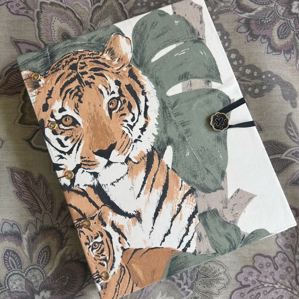 Ready-to-ship tiger with button closure notebook